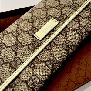 Authentic Gucci GG long wallet.  Brand new in box.